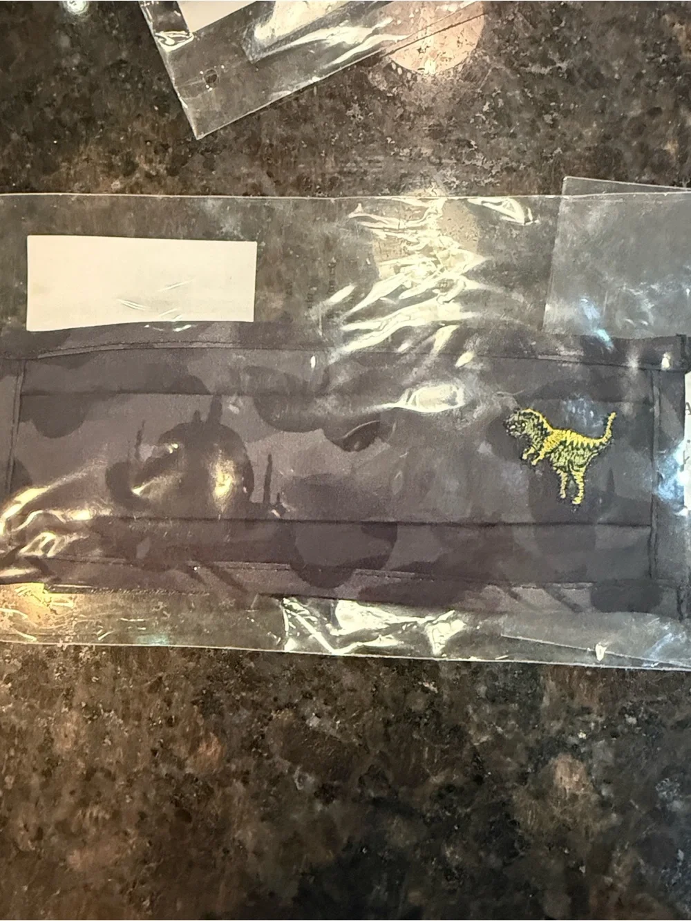 Coach Wild Rexy Men’s Black Camo Face Mask with Yellow Logo